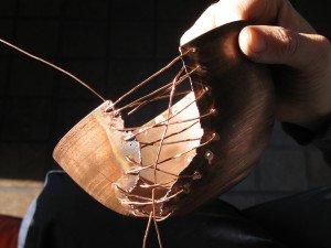 Sewing formed copper bowl with copper wire in copper enamel process, enameling